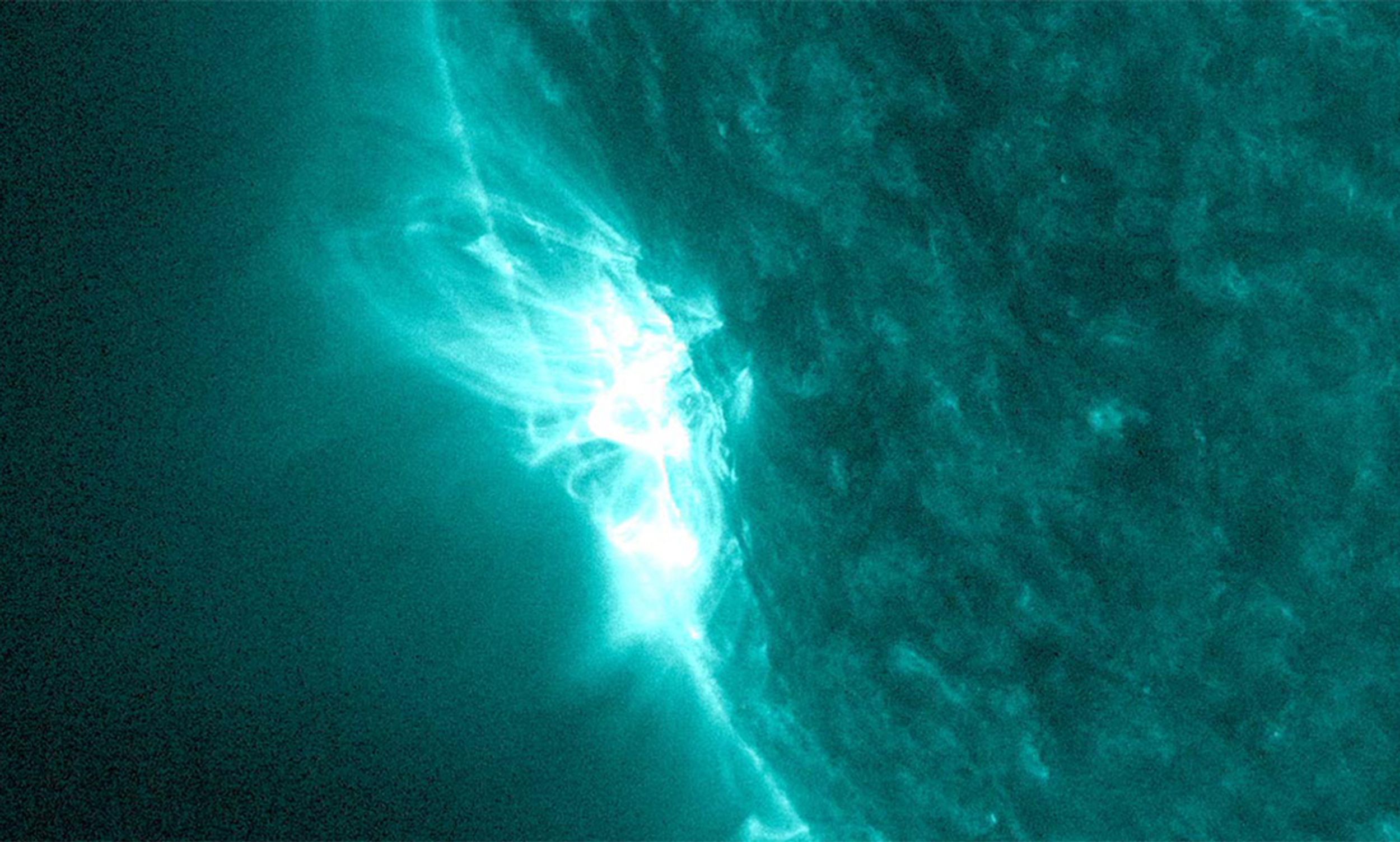 In 2013, NASA's Solar Dynamics Observatory captured a high-resolution image of a solar flare's magnetic fields twisting and snapping off -- to eject high-energy material into space.