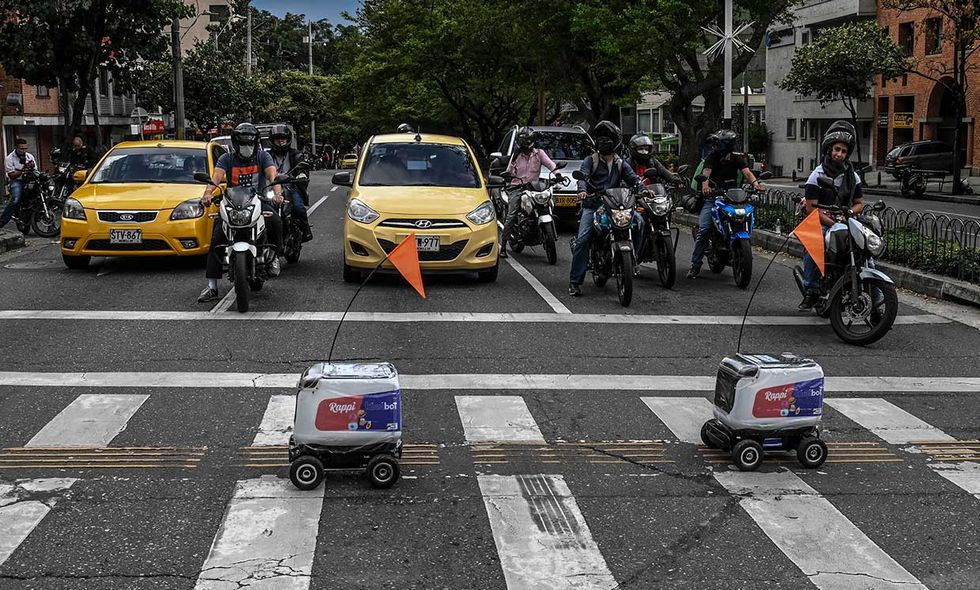 In Medell\u00edn, Colombia, a startup called Rappi deployed a fleet of robots, built by Kiwibot, to deliver takeout to people in lockdown