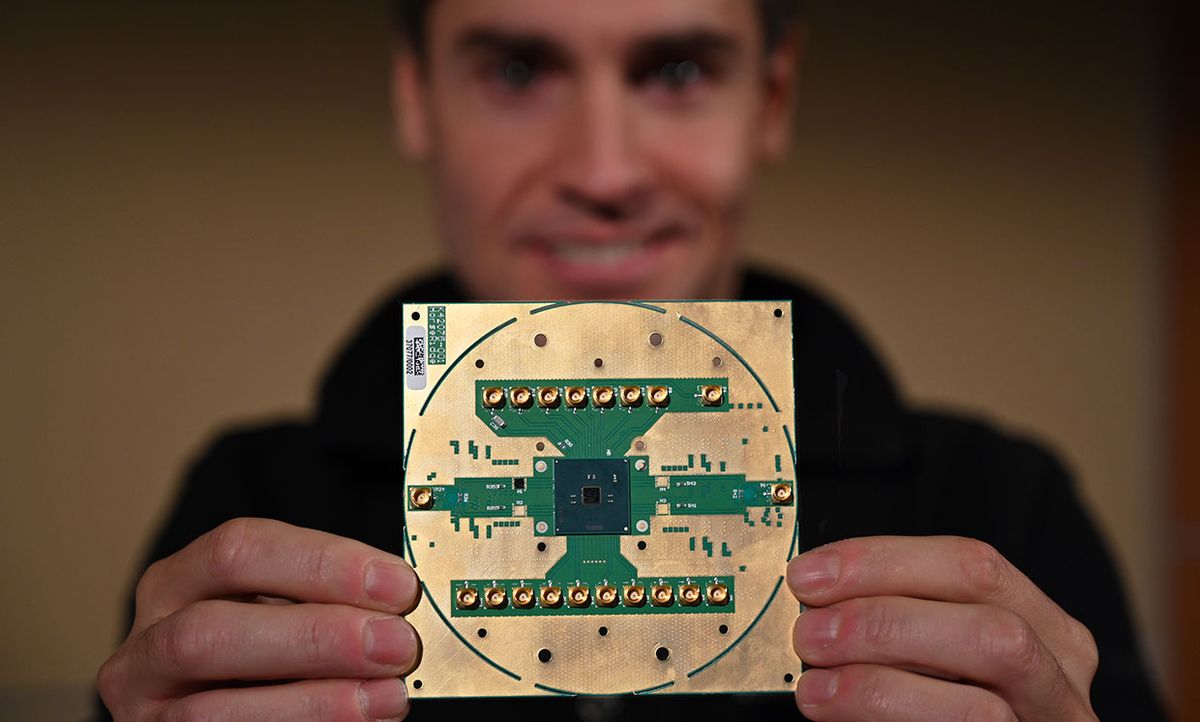 Intel Labs principal engineer Stefano Pellerano, holds Horse Ridge, a new cryogenic control chip to speed development of quantum computers.