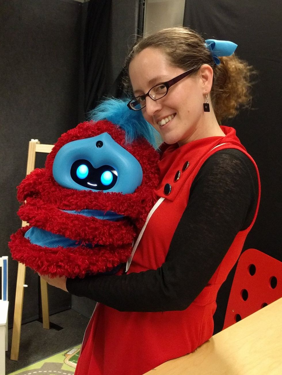 Jacqueline Kory Westlund with Tega robot
