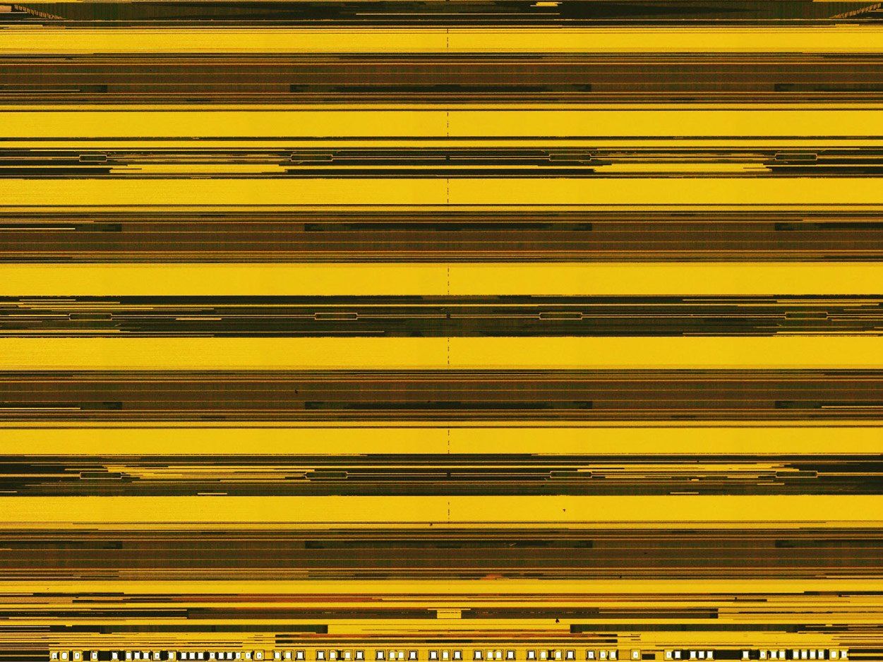 a photograph of layers of black and yellow stacked on top of each other 