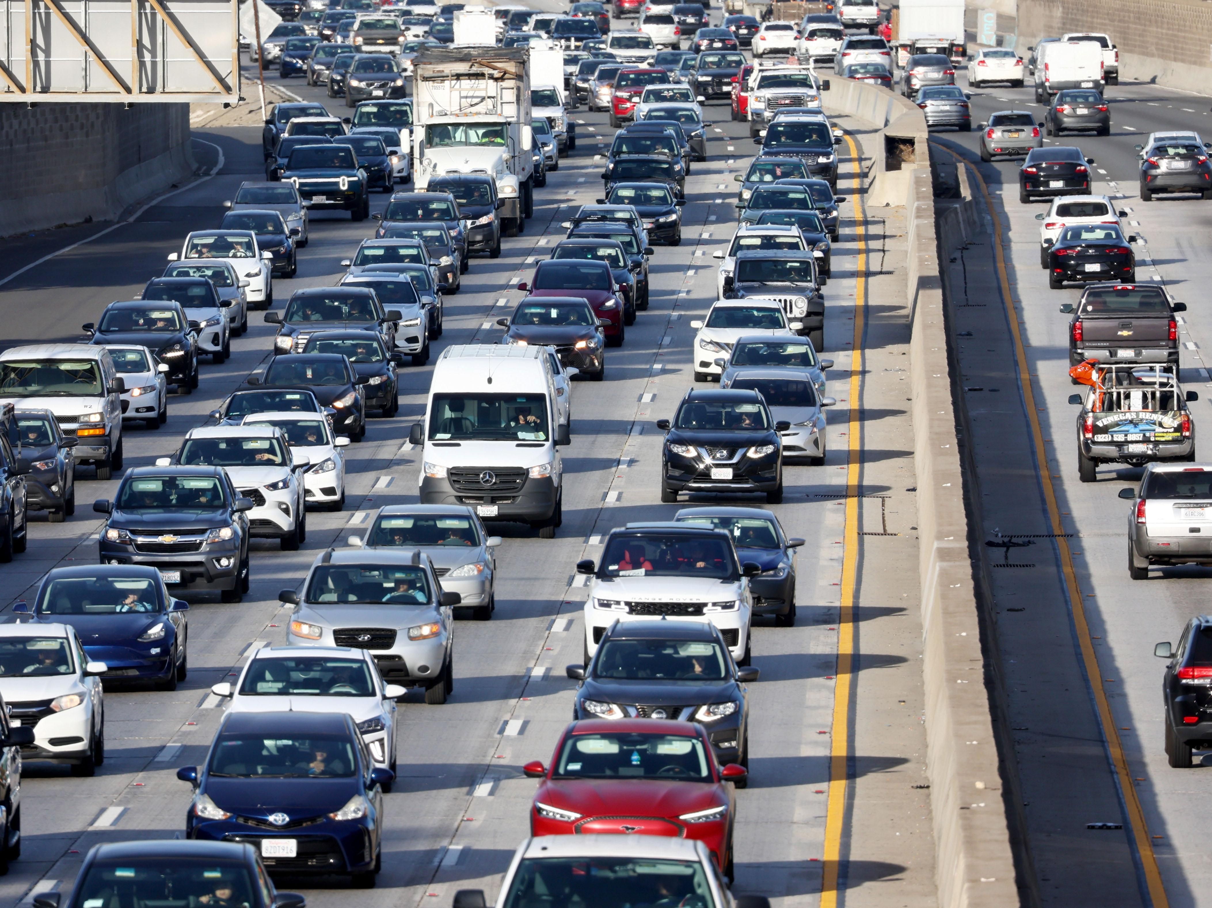 Heavy traffic moves along the 101 freeway on Wednesday morning November 23, 2022 in Los Angeles, California. 
