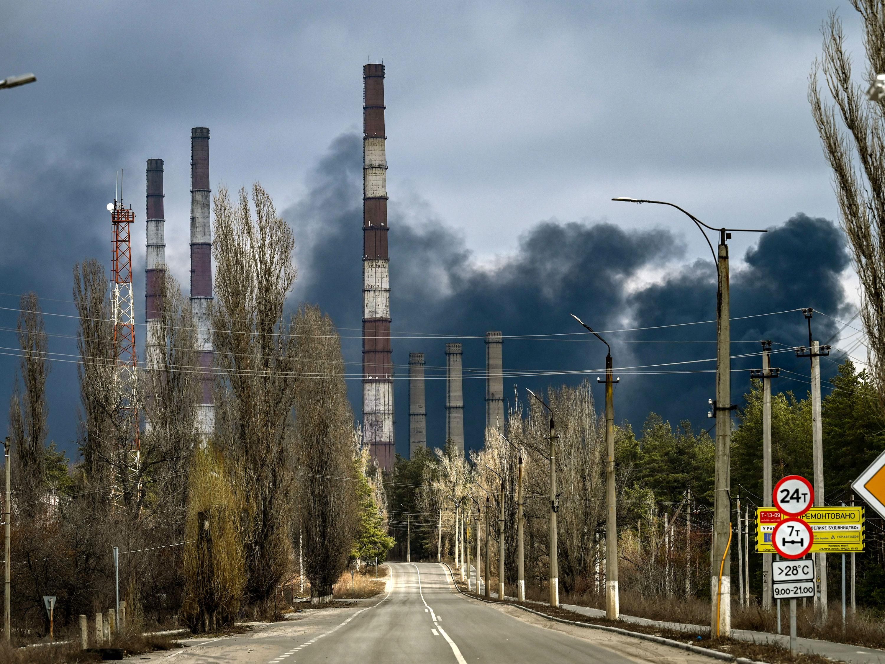 Smoke rises from a power plant after shelling outside the town of Shchastya, near the Ukraine city of Lugansk.