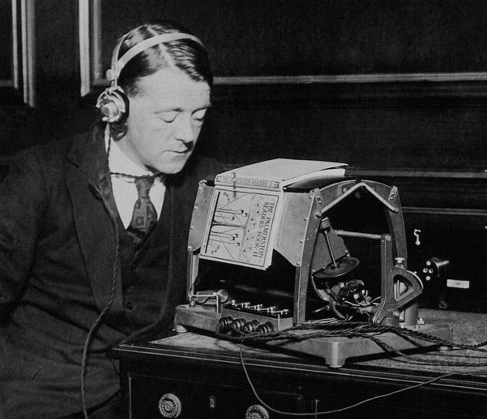 Man listening to an optophone