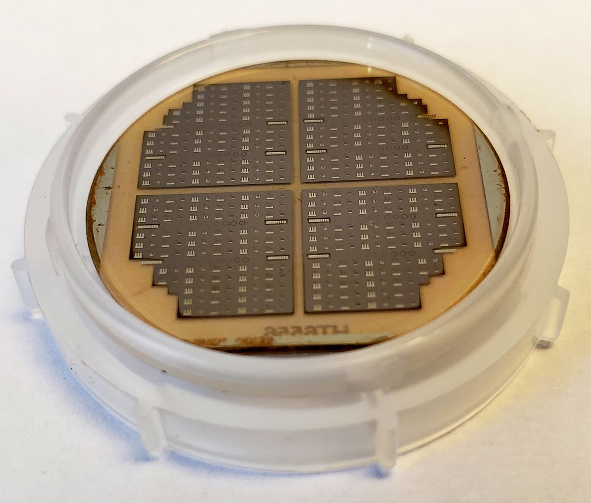 Many UV LEDs fabricated by Adroit Materials on AlN wafer from HexaTech