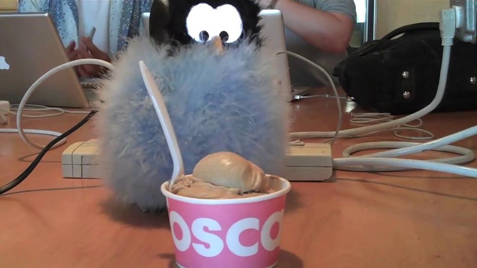 MIT Media Lab's Miso robot with a bowl of ice cream