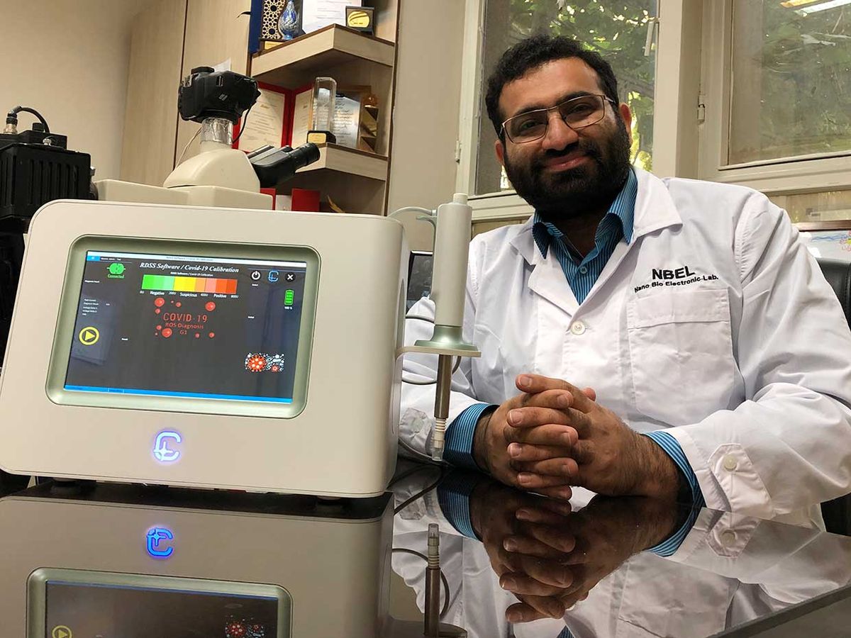 Mohammad Abdolahad, an associate professor of electrical engineering at the University of Tehran, holding the ROS Detector in Sputum Sample. 