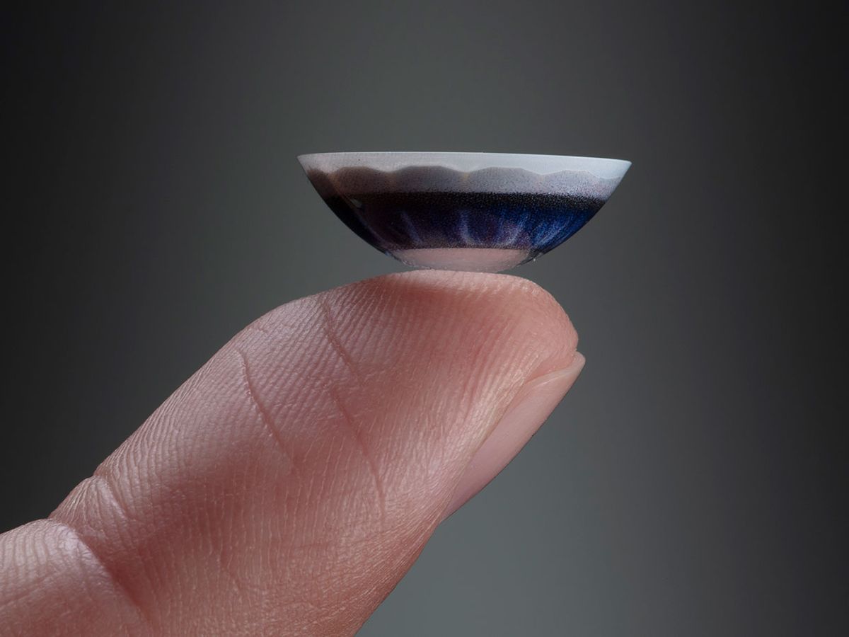 Mojo Vision contact lens prototype on a finger