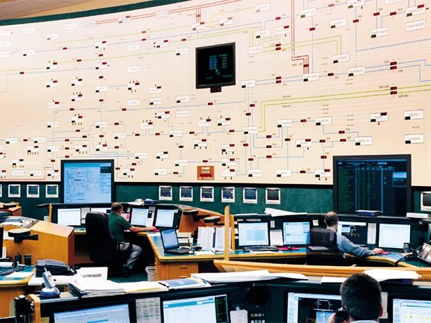 Photo showing controllers at the New England Independent System Operator in Holyoke, Mass.,