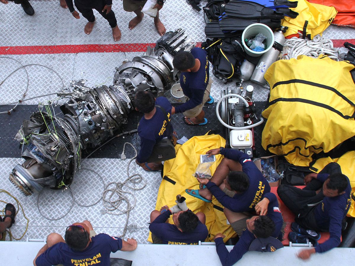 Parts of an engine of the ill-fated Lion Air flight JT 610 are recovered from the sea during search operations in the Java Sea, north of Karawang on November 3, 2018.
