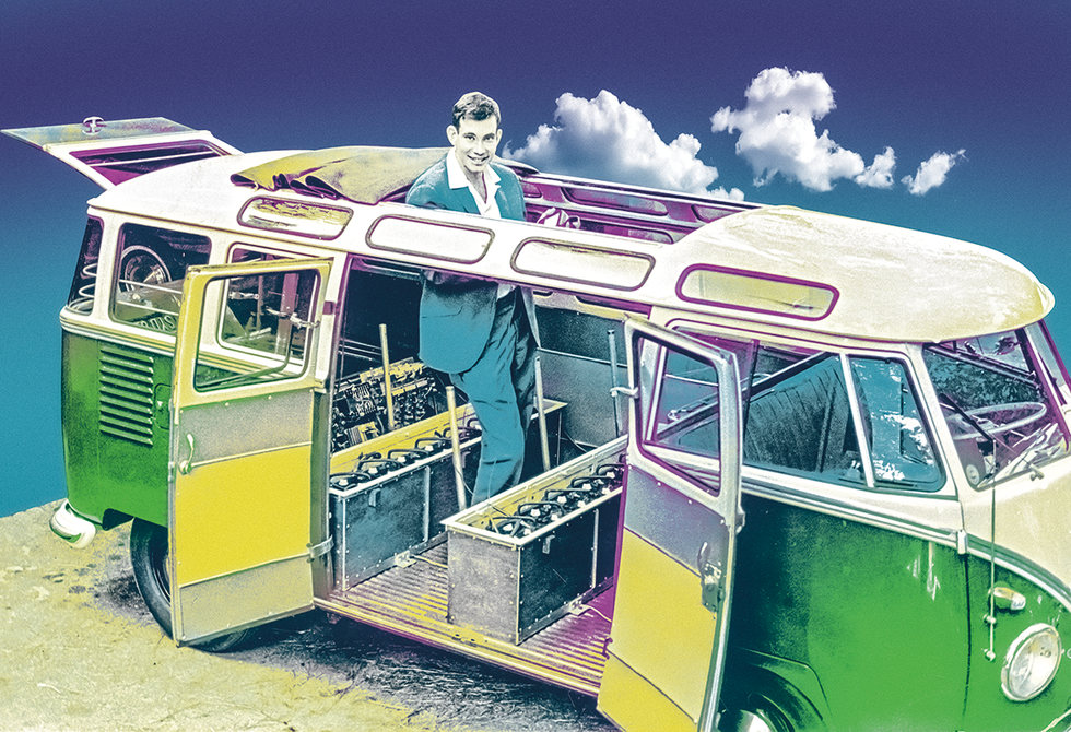 Photo-illustration of a young man standing inside a 1960s era Volkswagen van with its doors and top open to reveal banks of batteries inside.