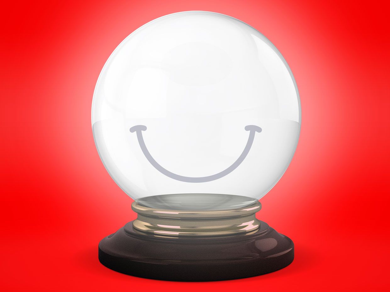 Photo illustration of the crystal ball with a smile on it.