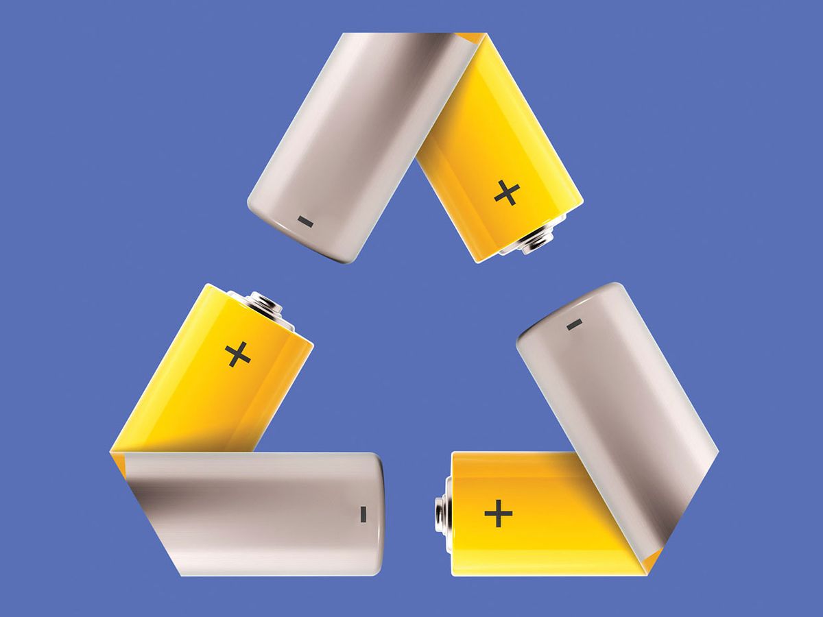 Photo illustration of the recycle symbol made up of batteries. 