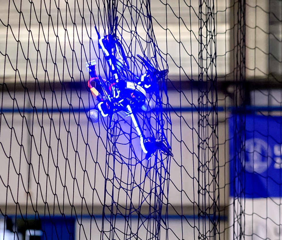 photo-of-a-drone-stuck-in-a-net.png?id=3