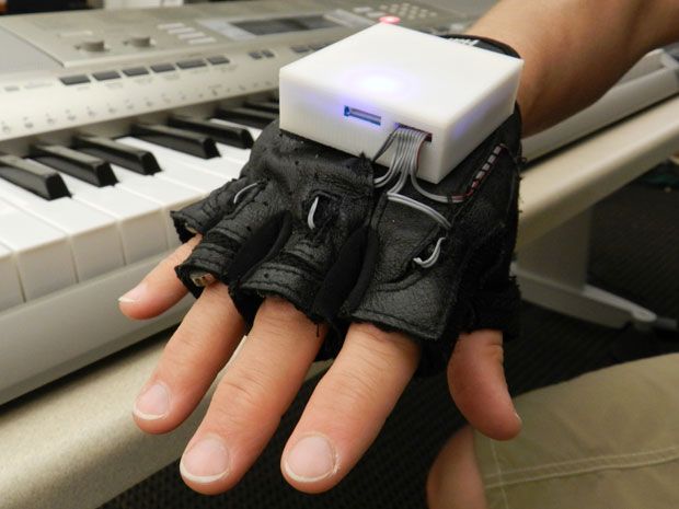 Photo of a hand with wearable computer. 