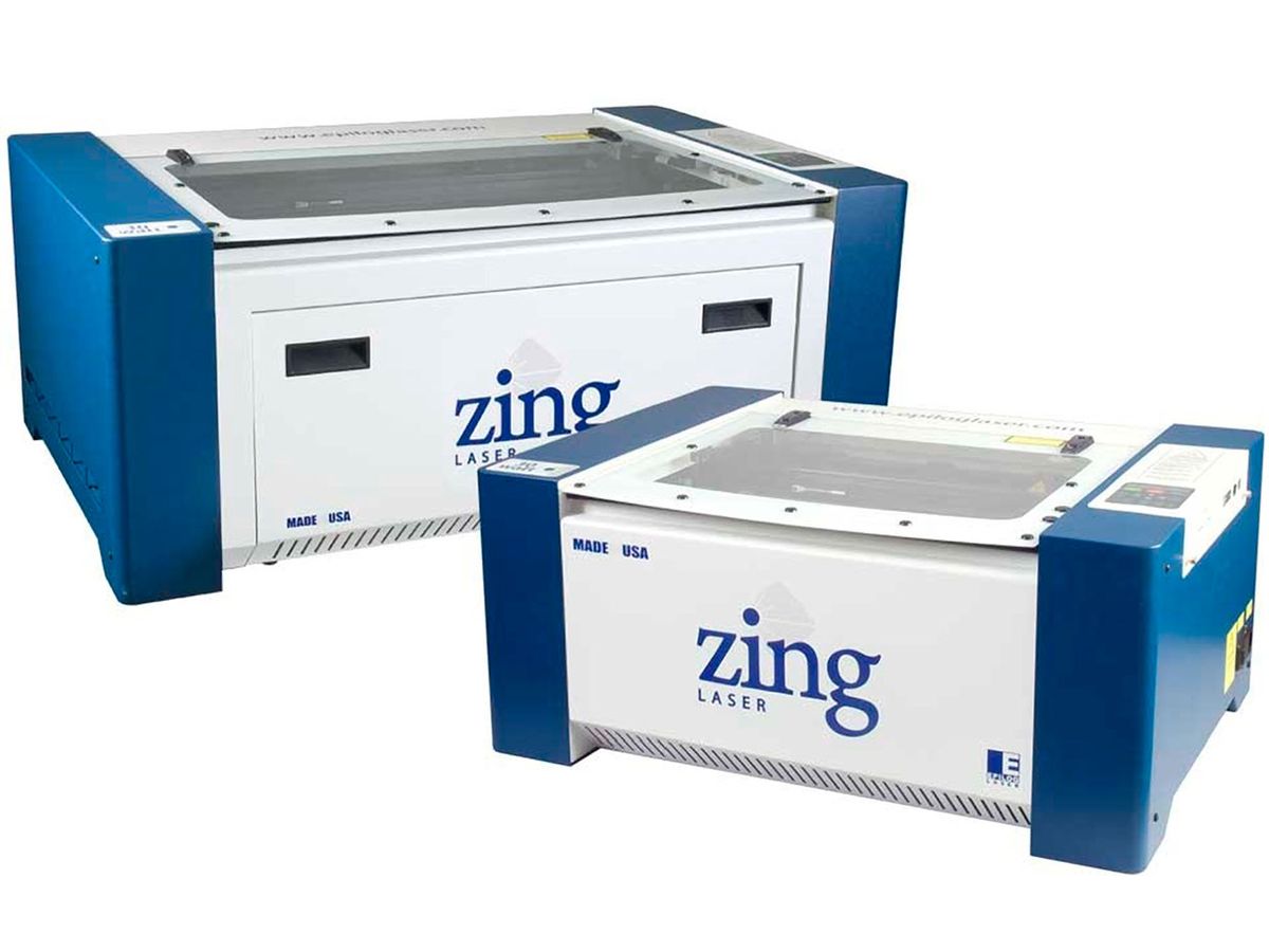 Photo of a pair of Epilog laser cutters.
