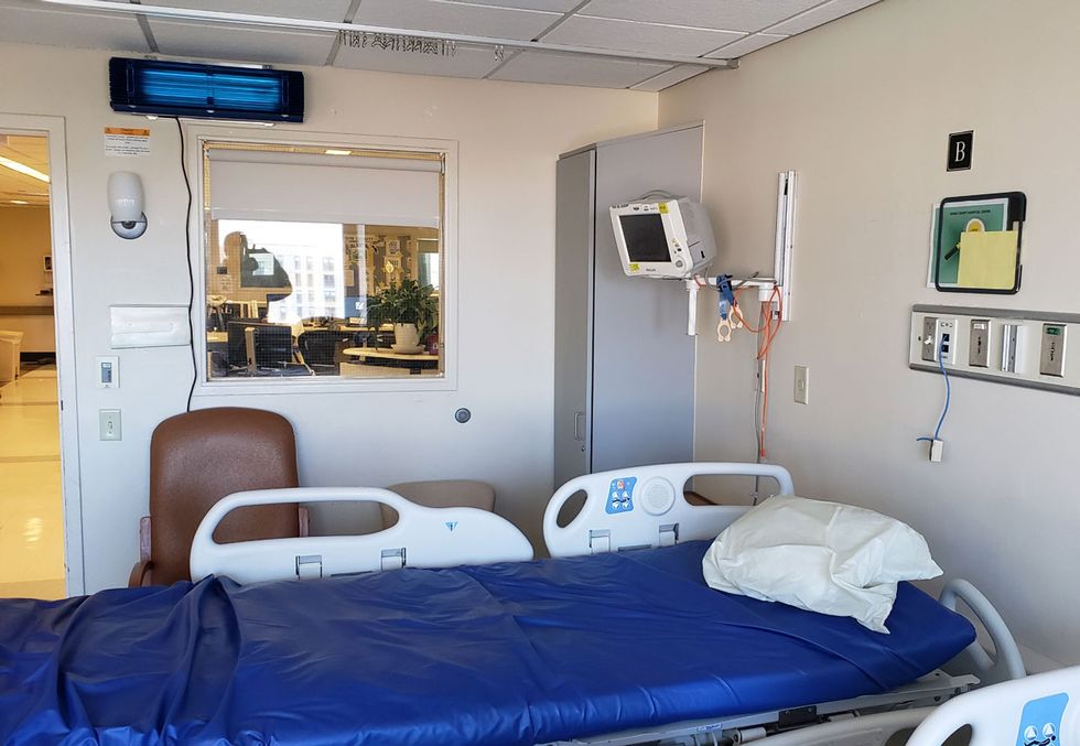 Photo of a patient room in a hospital.