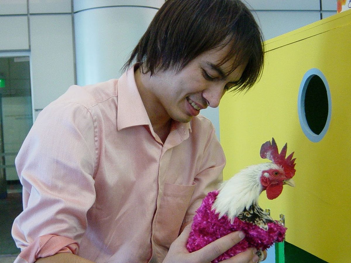 photo of Adrian Cheok with chicken