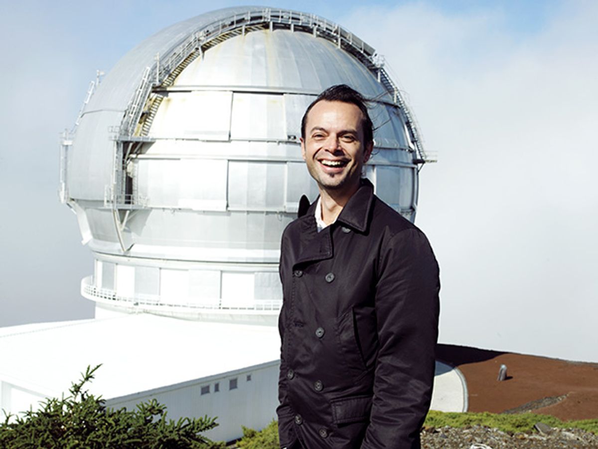 Photo of José Losada standing in front of the world’s biggest telescope.