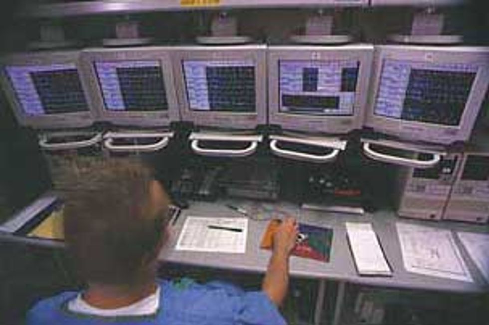 photo of person using PatientNet, the medical telemetry system