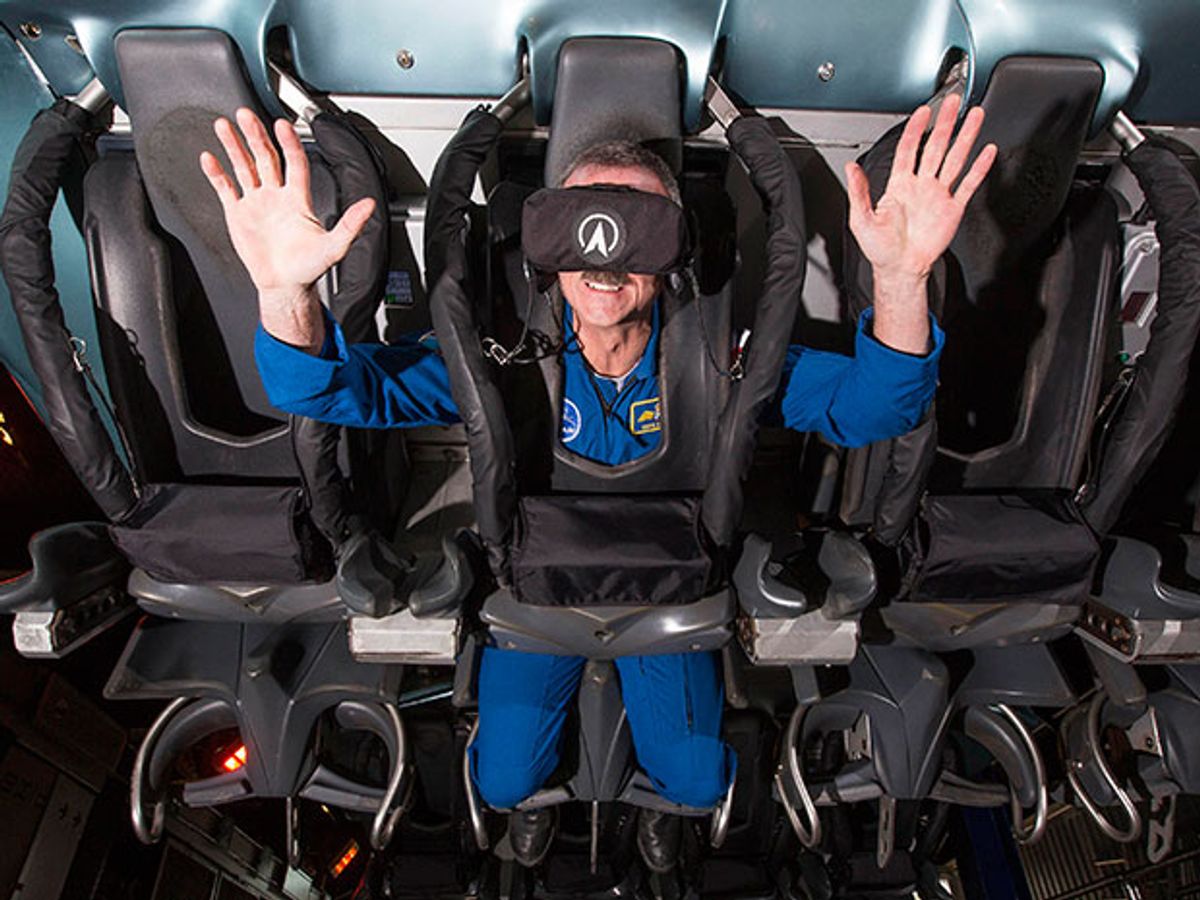 Photo of rider on a virtual reality roller coaster.