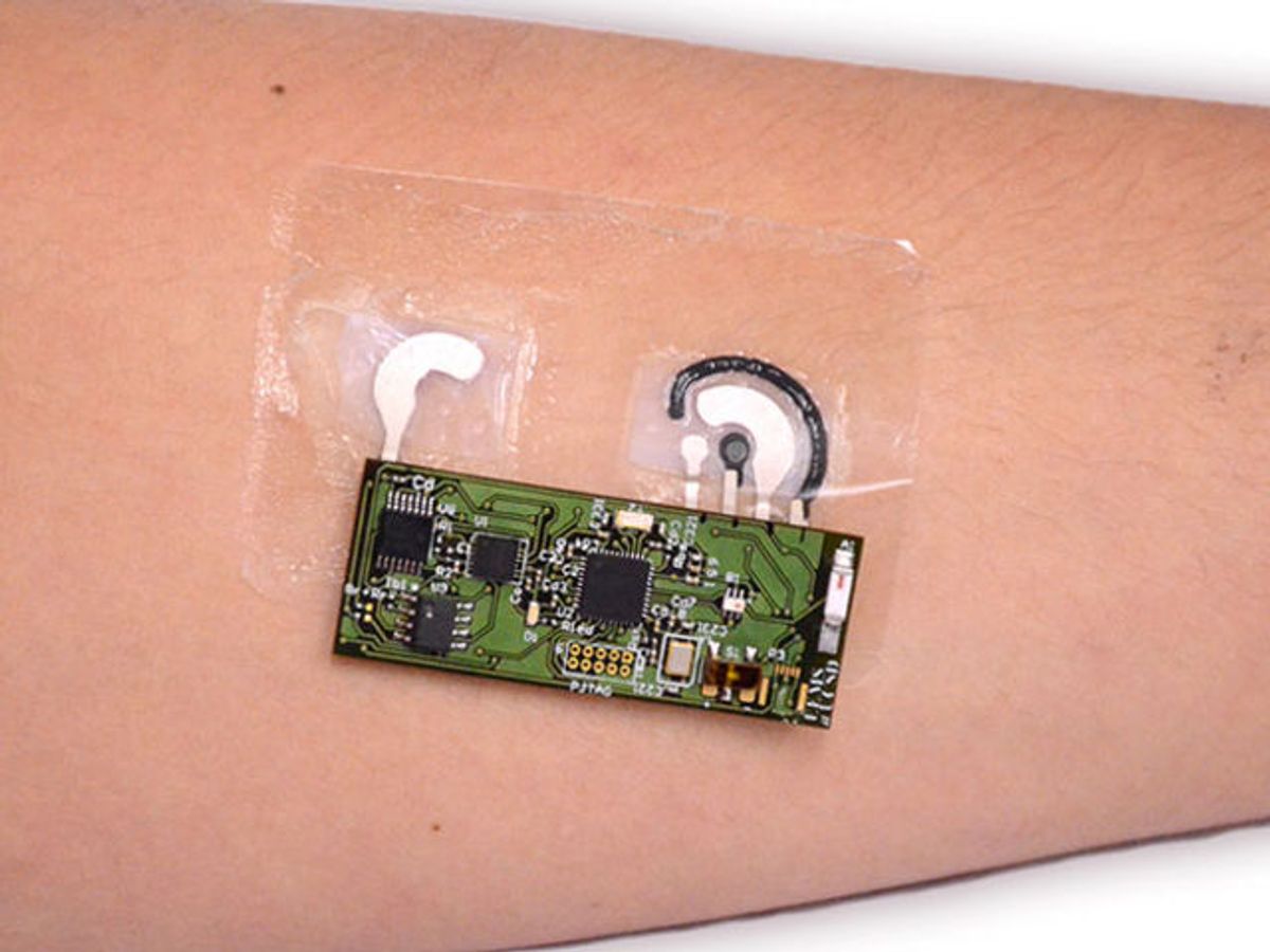 photo of the tattoo shows clear bandage on skin connected to miniature circuit board