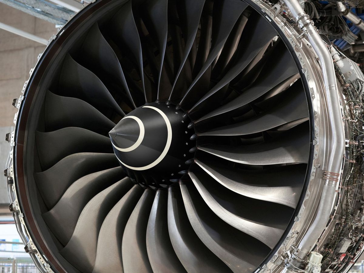 Photo of turbine, fan blades and housing of a jet engine for a commercial-sized jet airliner