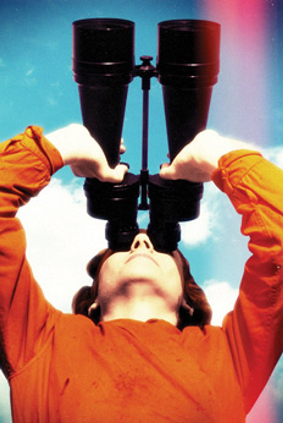photo of woman with binoculars