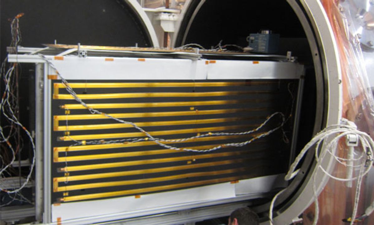 Photograph showing the Archinaut entering a Thermal Vacuum Chamber (TVAC).