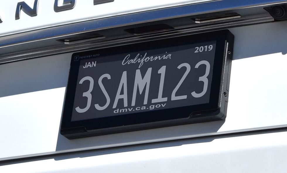 https://spectrum.ieee.org/media-library/photographer-of-reviver-auto-s-customizable-license-plate.jpg?id=25585942&width=980