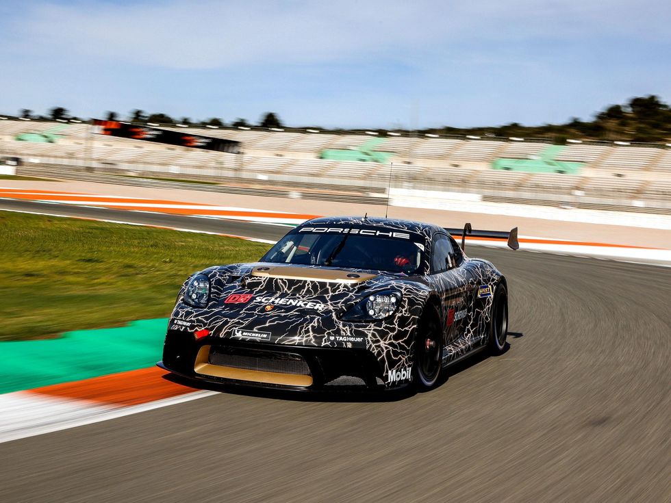 porsche electric vehicle driving on a track