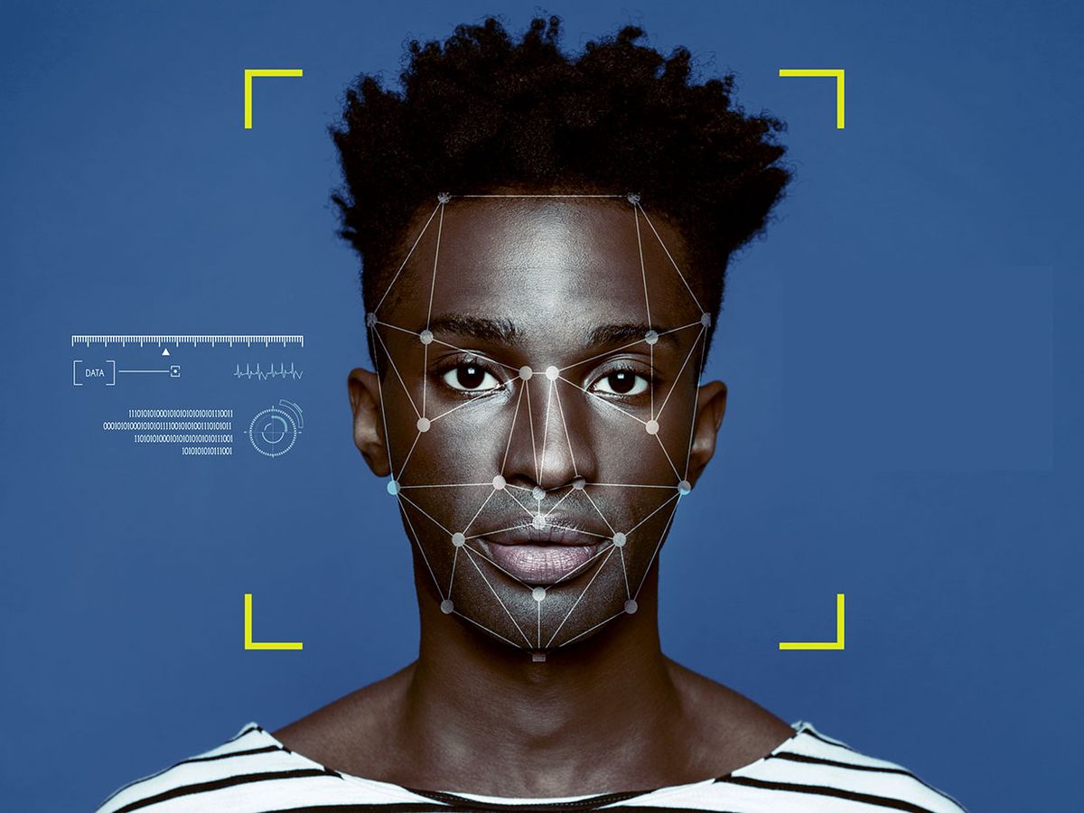 Portrait of a young black man with facial recognition markers on his face