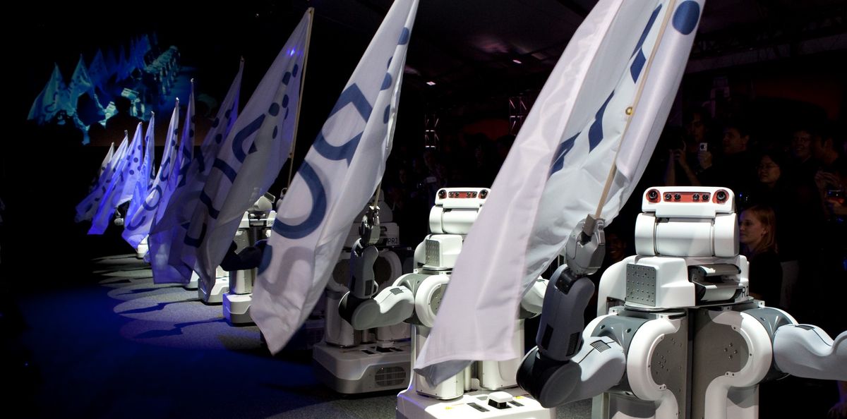 PR2 robots flying ROS flags in 2010.