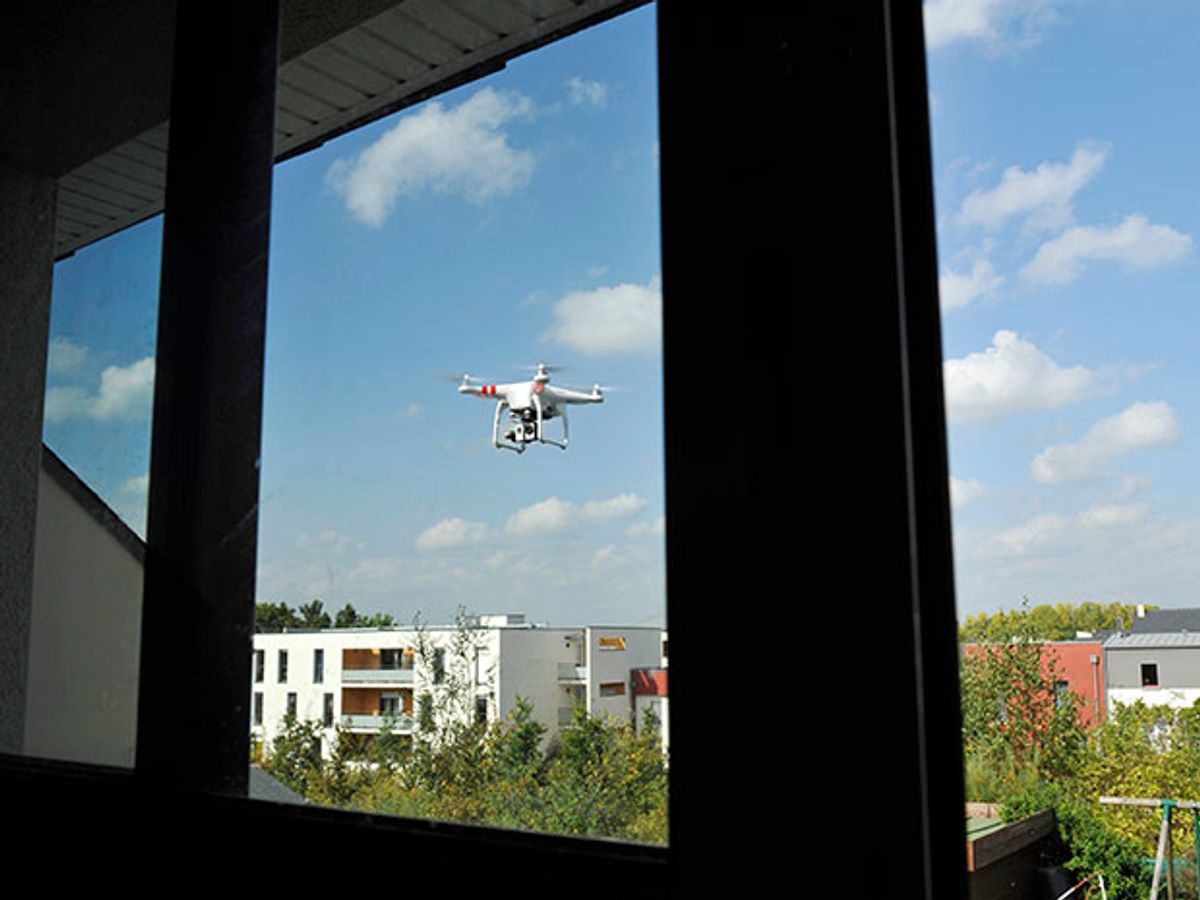 Quadcopter flies close to a window