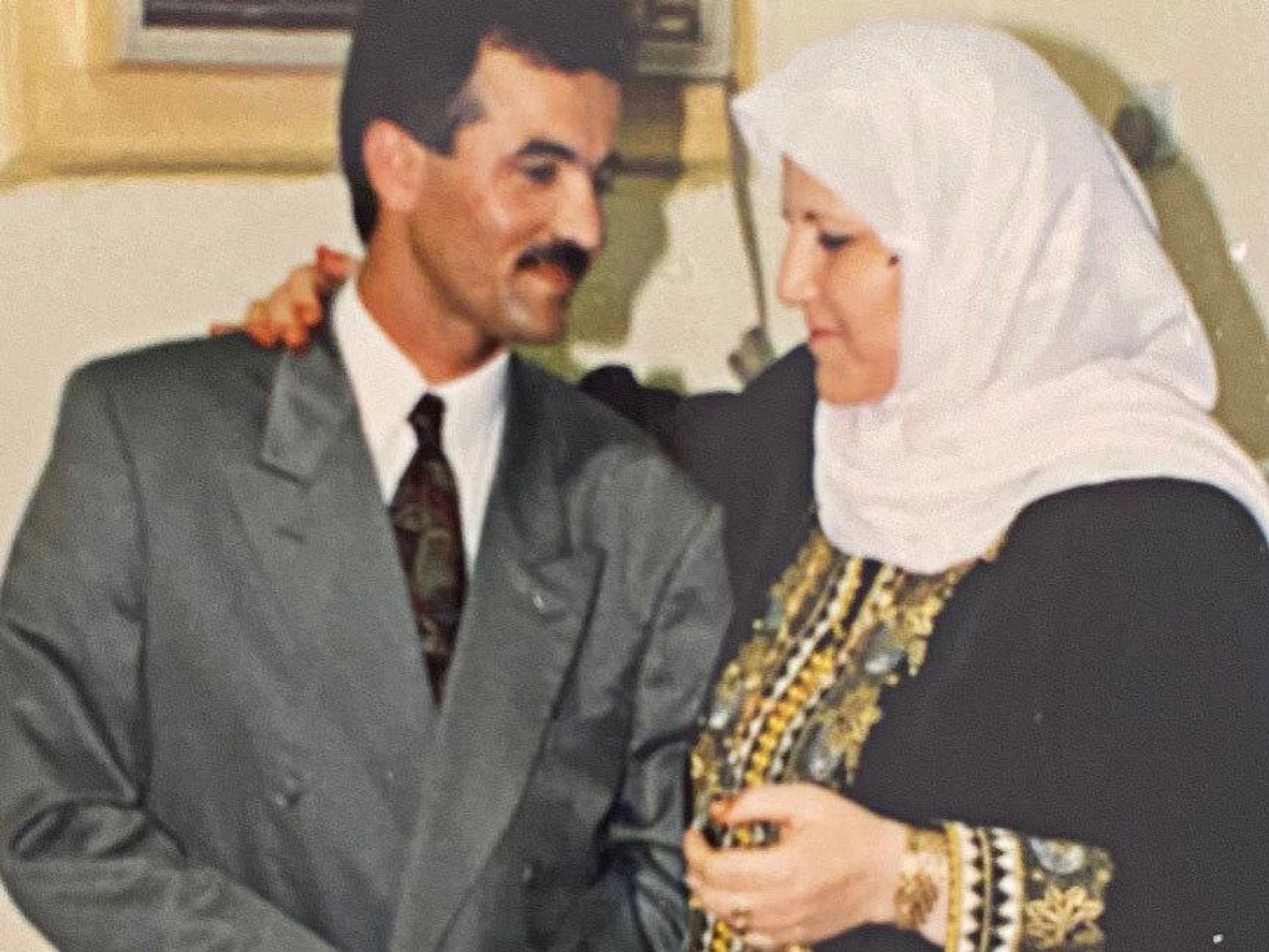 Qusi Alqarqaz and his mother.