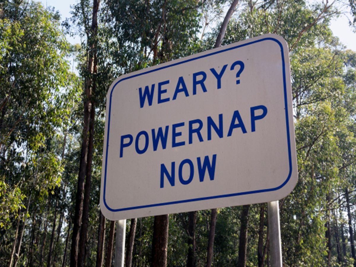 road sign that says, weary? power nap now