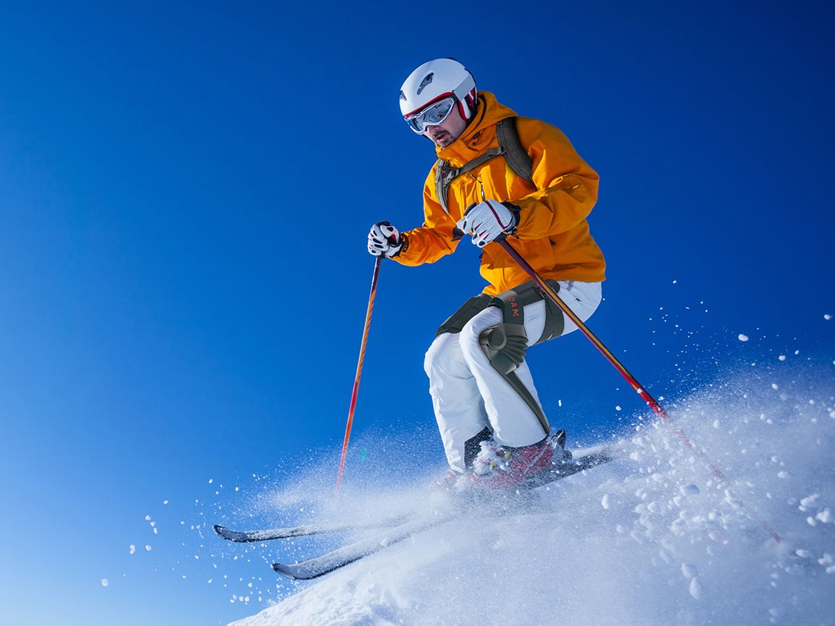 Roam Robotics' skiing exoskeleton in action on the slopes.