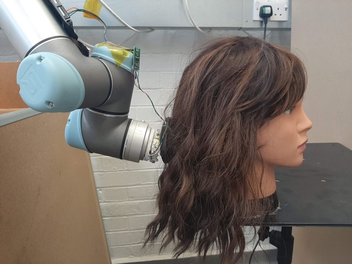 Robot hair brushing