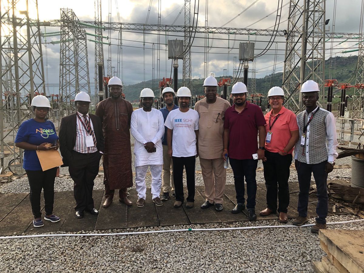 Sampathkumar Veeraraghavan [sixth from left] visiting a power plant in Abuja, Nigeria during the 2019 IEEE Power Africa conference.