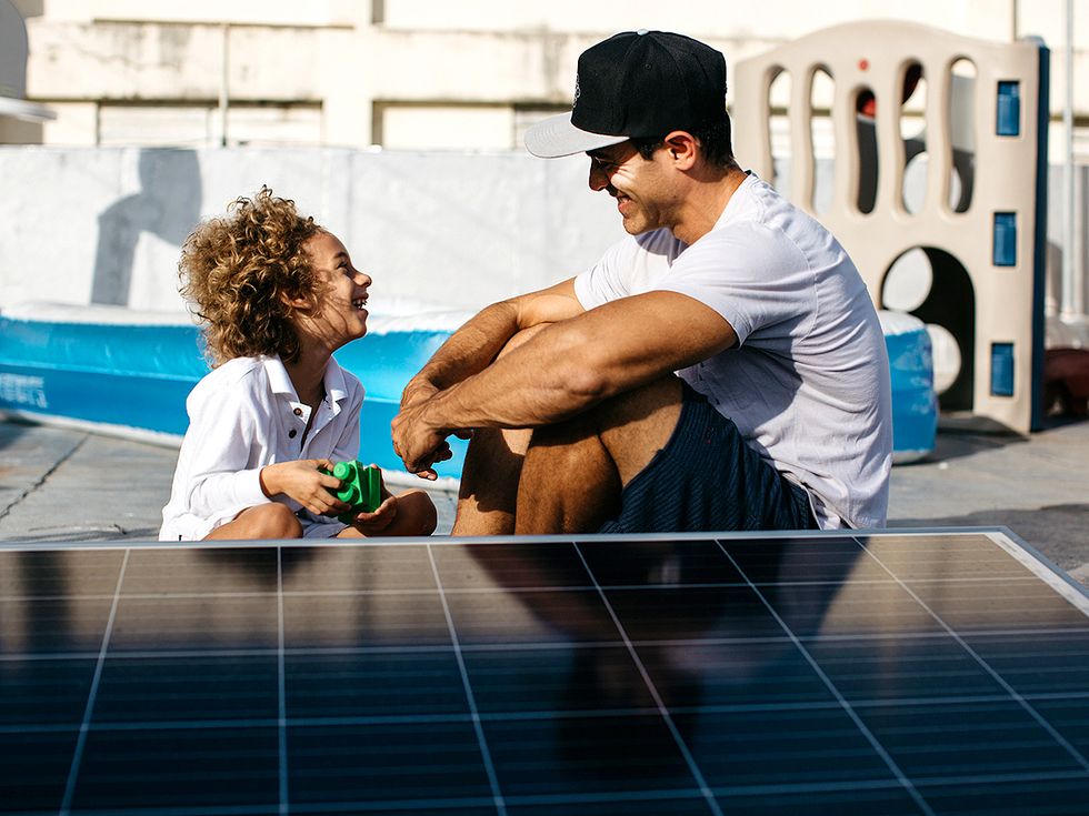 Sergio and solar engineer Gabriel Rivera.