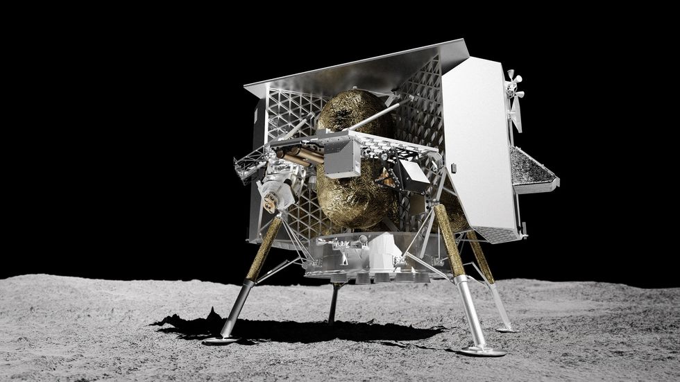 Silvery four-legged spacecraft on simulated plain on the moon with black sky in the background.