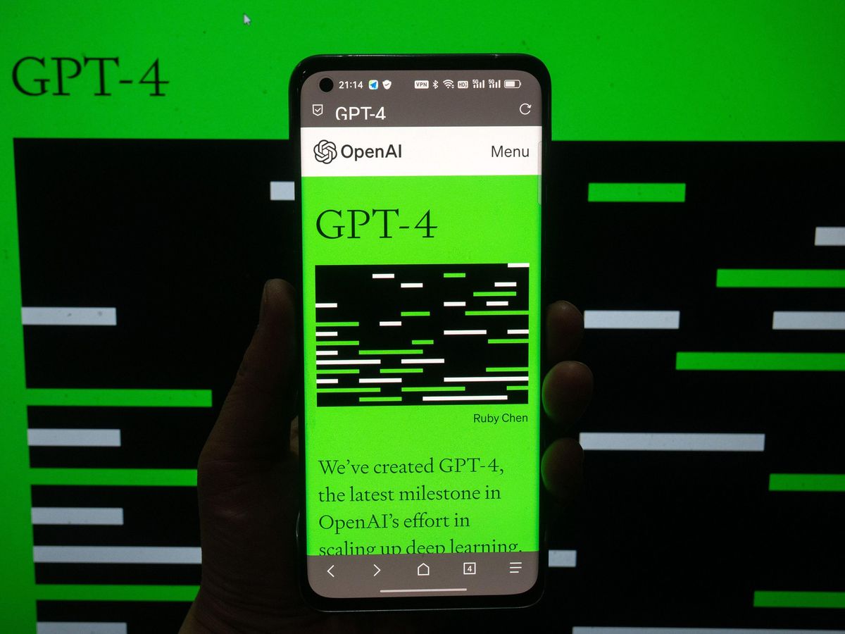 smartphone with green and black image on the screen against a green and black background