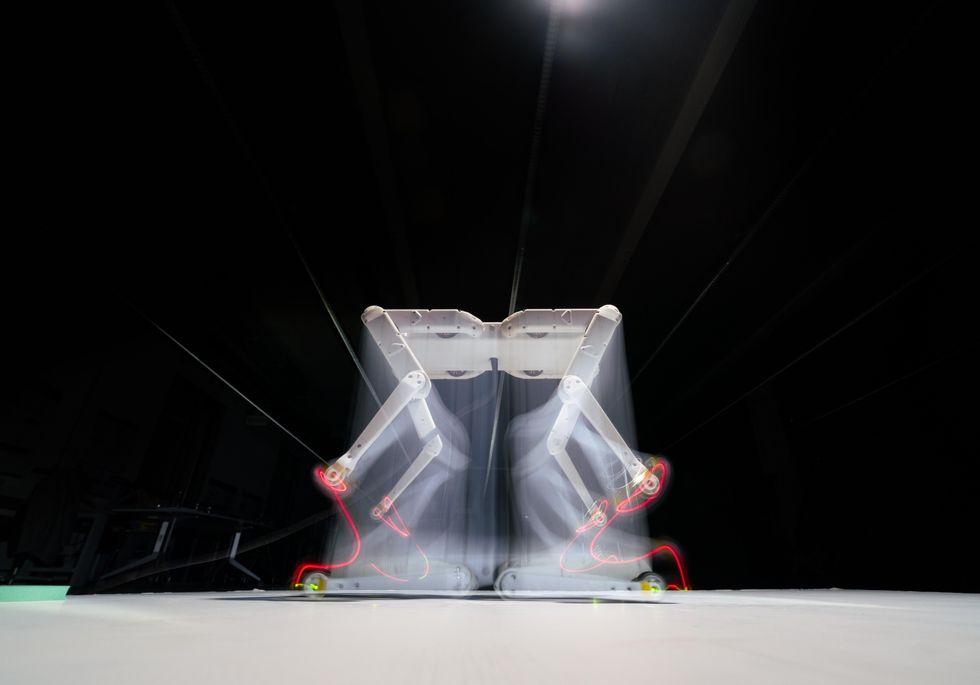 Solo 8, an open-source, research quadruped robot performs a jump.