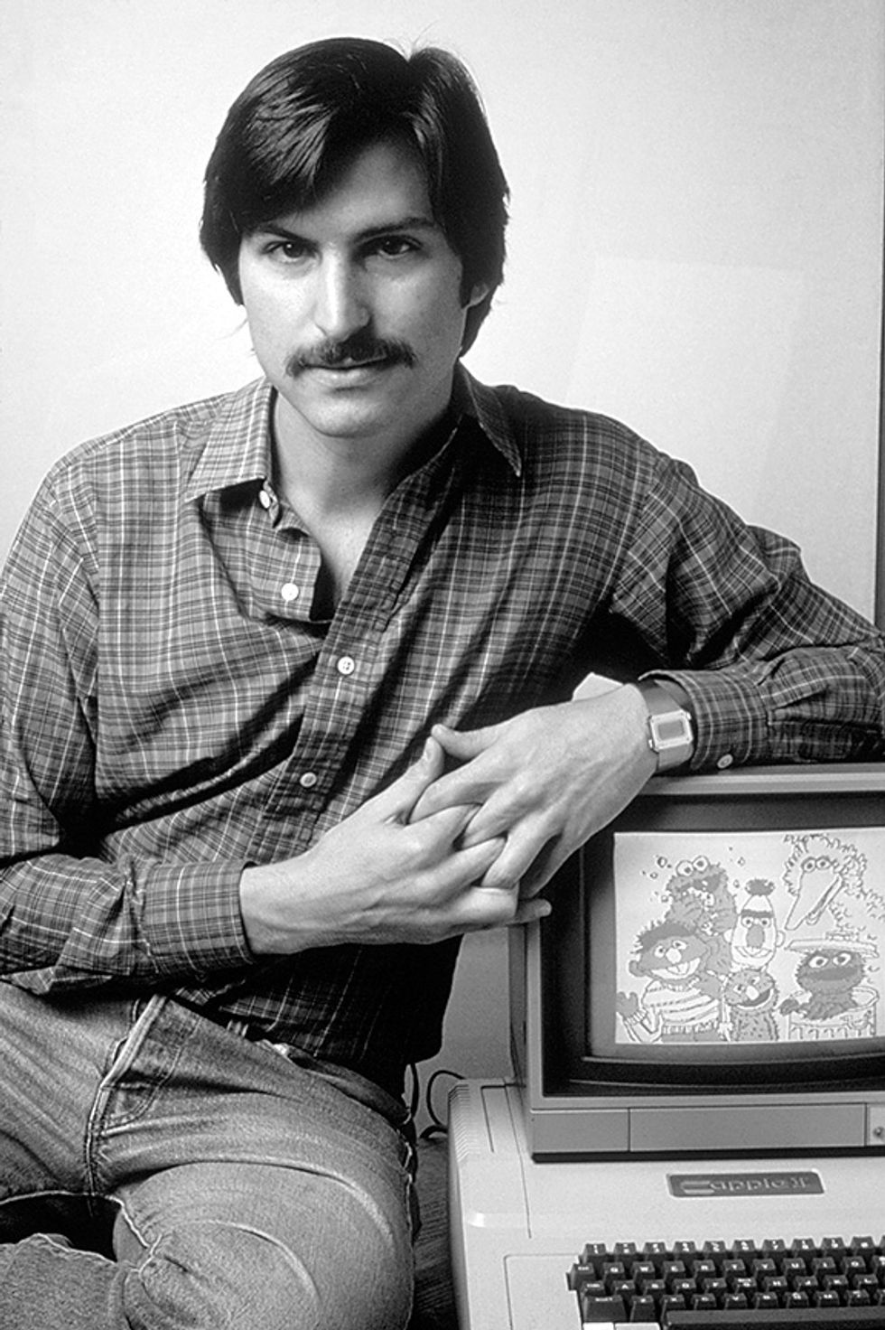 Steve Jobs with an Apple II personal computer in 1981. 