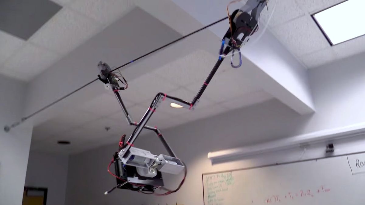 Tarzan robot can swing around on overhead wires 