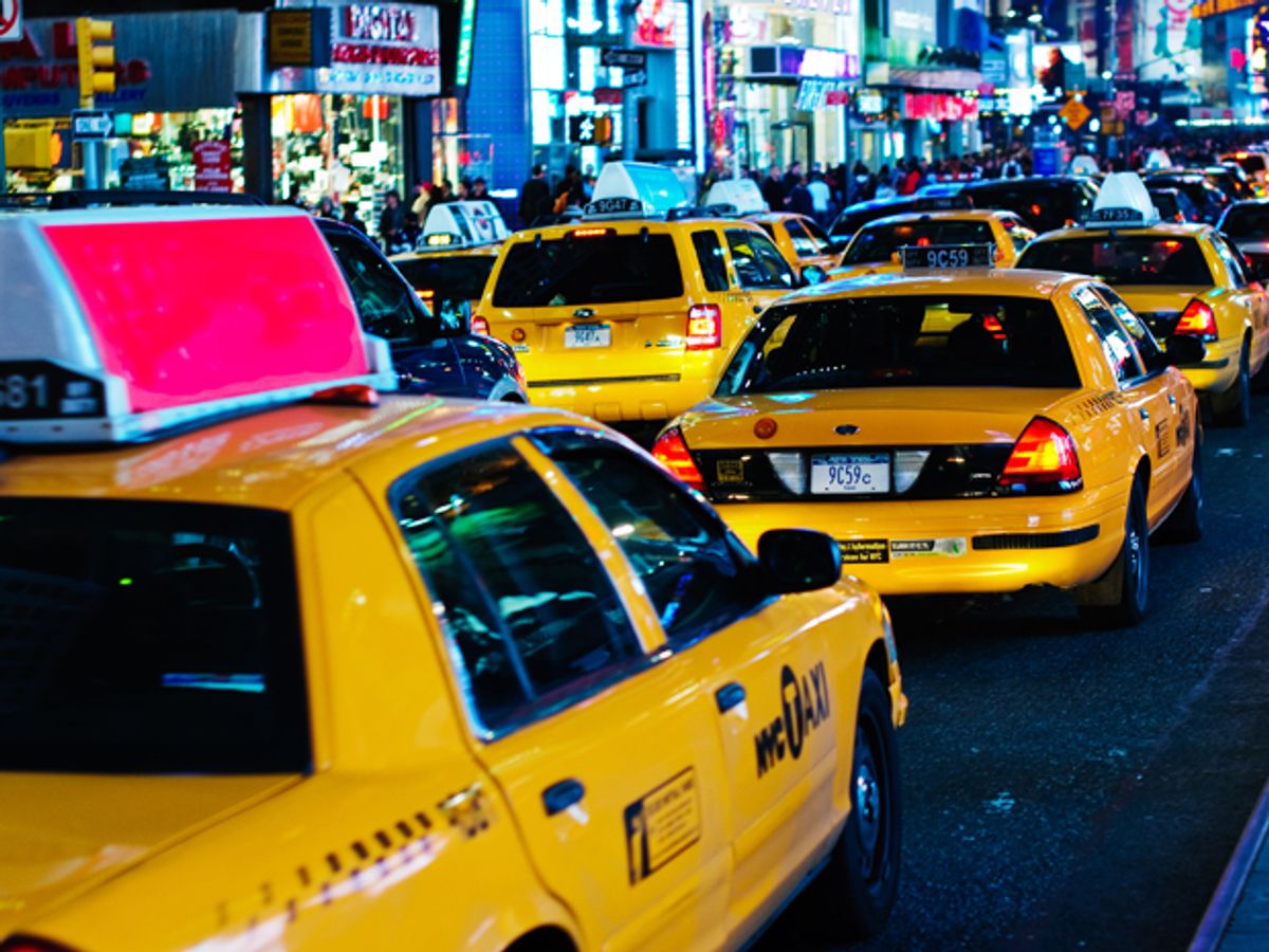 Taxi cabs in traffic.