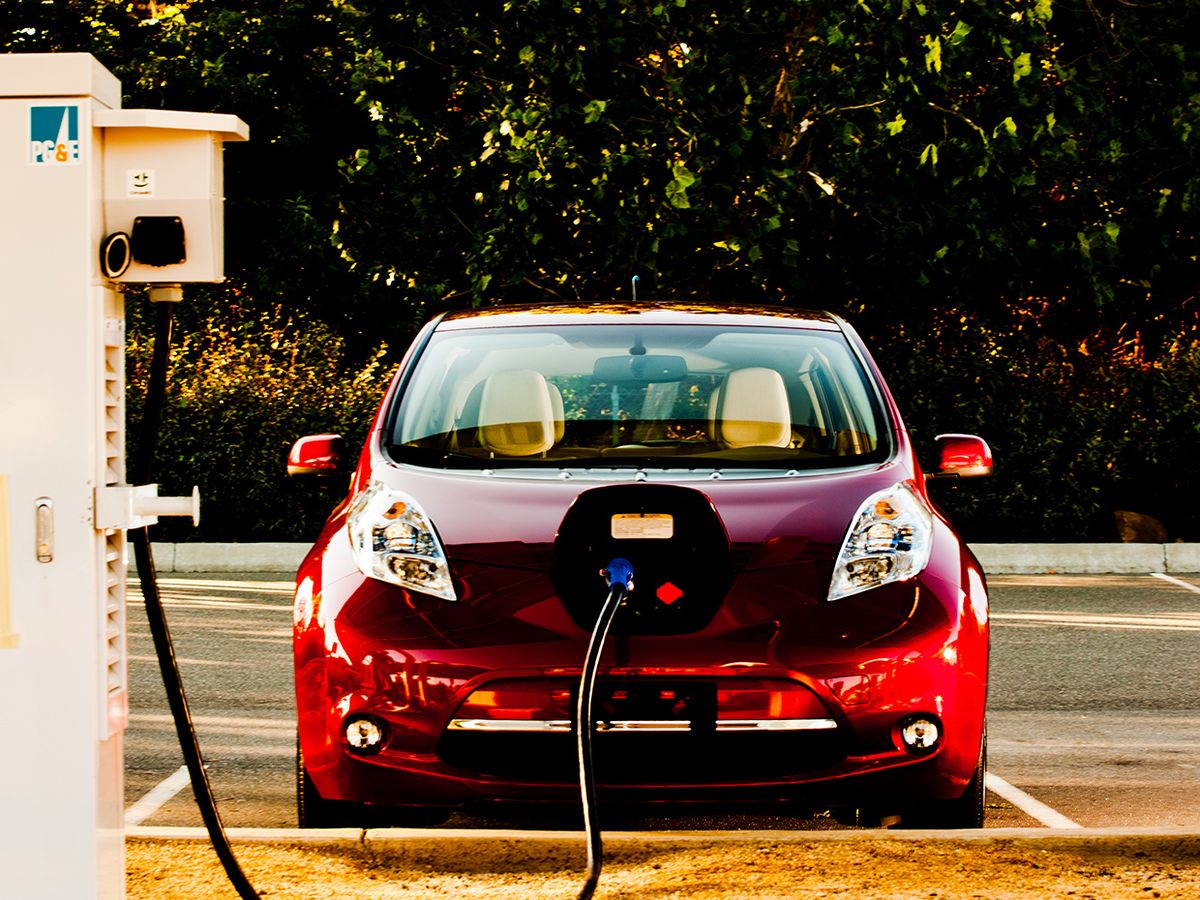 The author’s all-electric Nissan Leaf being charged.
