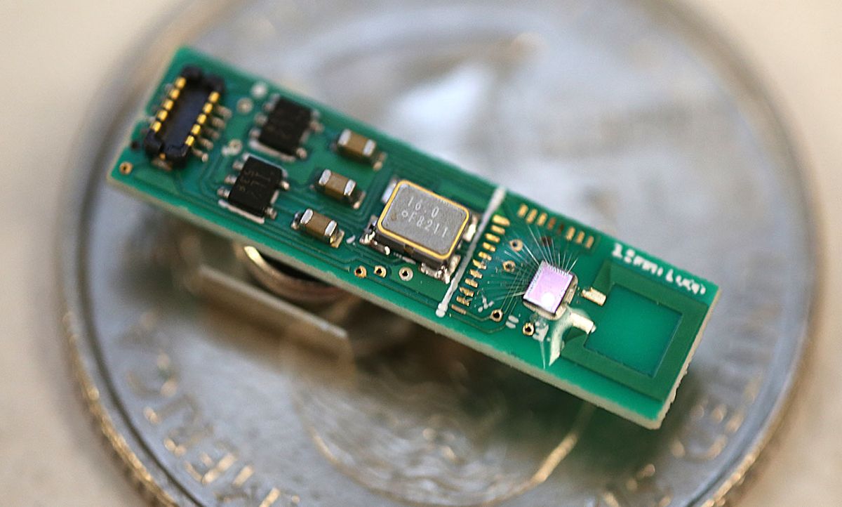 The Bluetooth transmitter chip [lavender, right] is connected to a magnetic monopole antenna [green, far right], which acts as an integral part of the transmitter's resonator circuit.