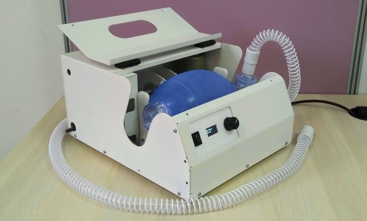 The RespiratorApparatus is one of Breath of Hope's low-cost ventilator designs, which automates bag valve mask pumping.