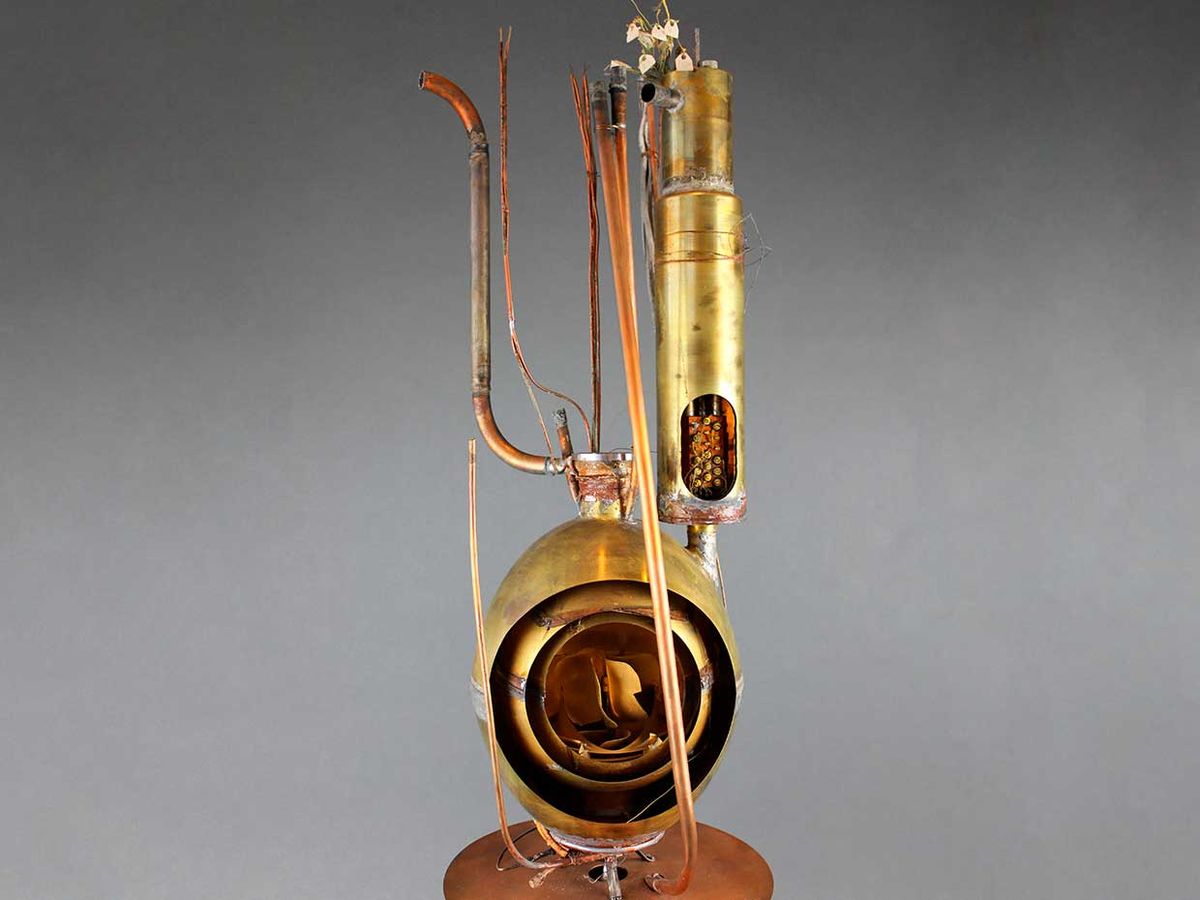 This 1937 steam calorimeter was invented at the U.S. National Bureau of Standards to measure the output of steam power equipment. The front of the instrument has been cut away to show its layers.